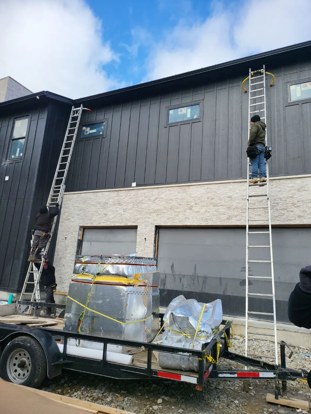 Siding installation documented in Geist