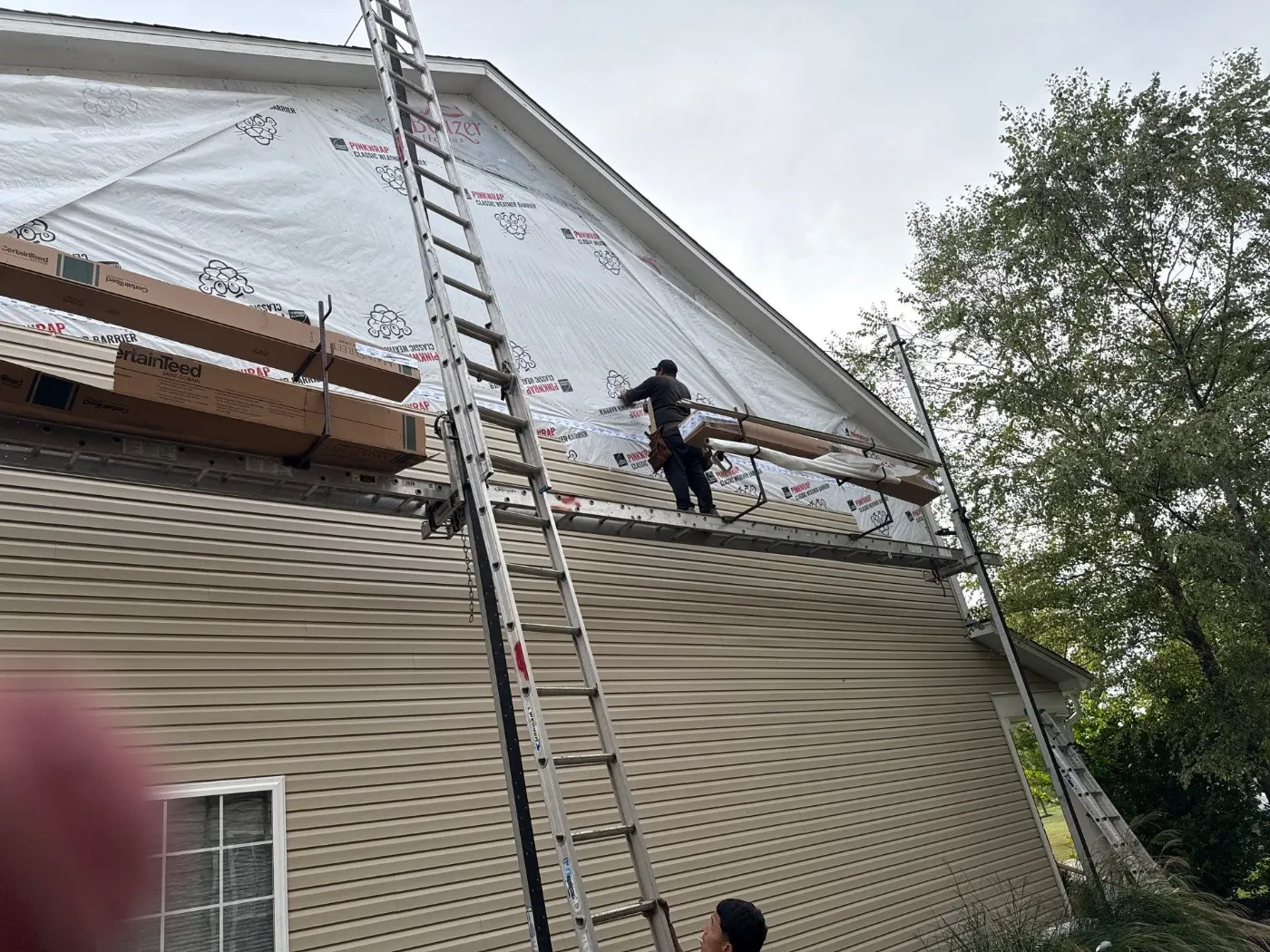 Storm-damaged siding documented in Geist